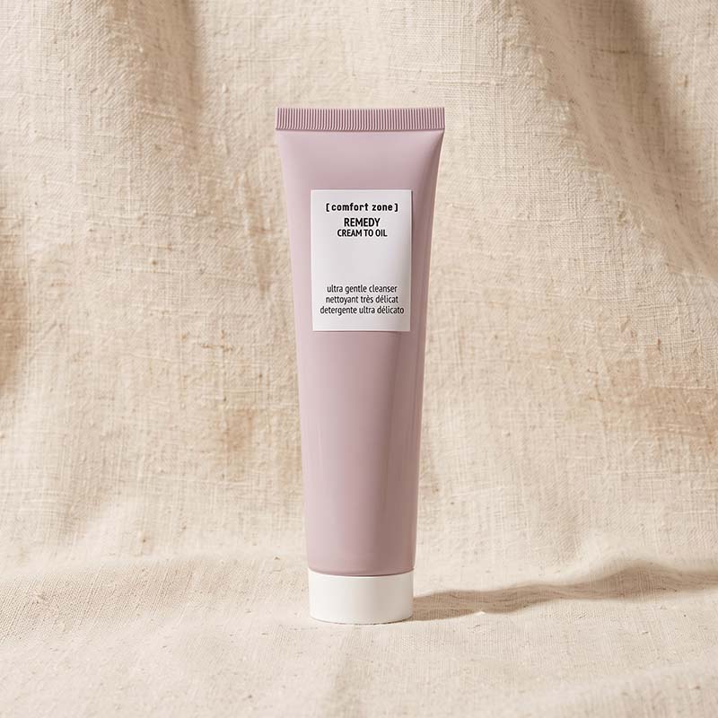 A gentle cleanser for sensitive skin in a pink tub with a white label
