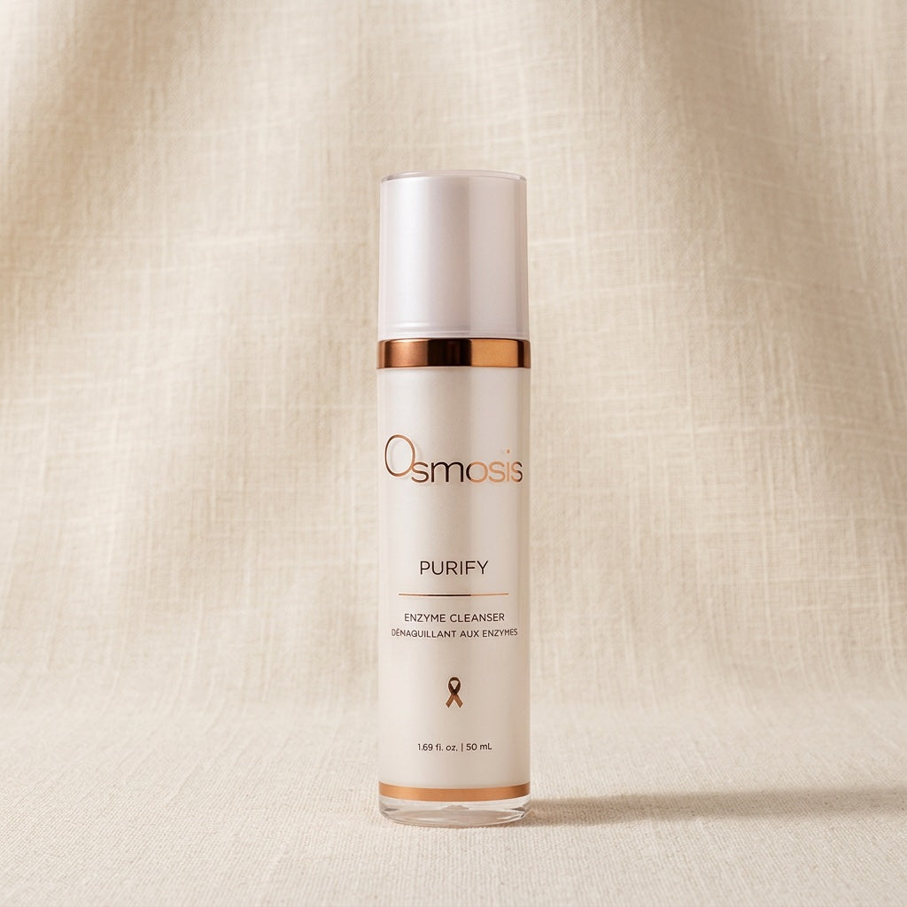 osmosis skincare Purify cleaner in a white bottle with copper accents